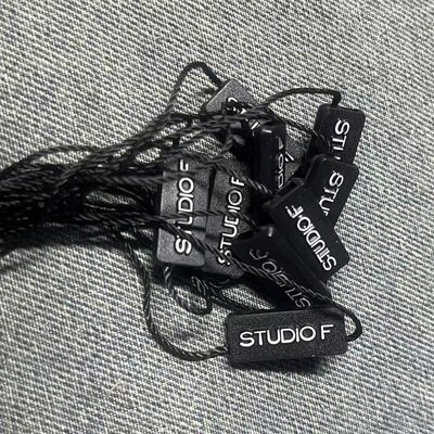 Plain Black Hang Tag String Quantity 100 Pieces Thickness 0.2mm Suitable for in Apparel Accessories and Product Packaging